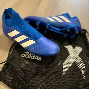 Adidas Men’s Nemeziz 18+ SG blue cleats, originally $250 (Includes bag).